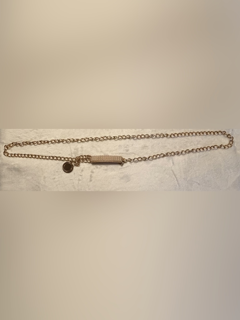 Gold chain belt with rhinestone detail